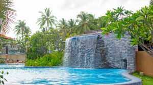 Outdoor Kitchen + Pool + Waterfall: Creating the Ultimate Entertaining Space